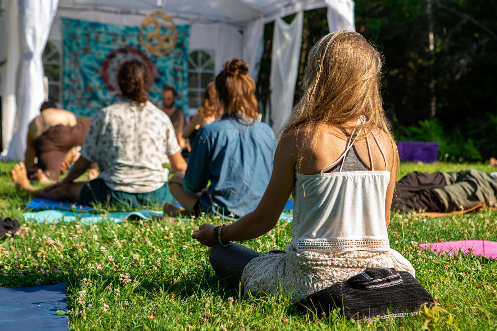 A community meditation gathering outdoors